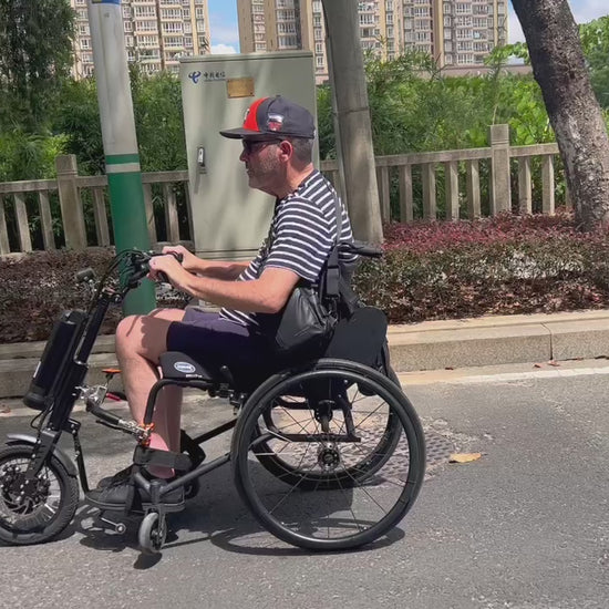  power assist wheelchair attachment 30km per hour max speed 😎 in China V means cool so no offence !! 😜