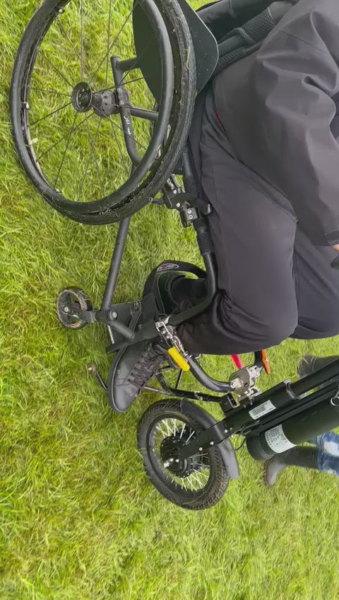  power assist wheelchair attachment Using on the field no problem 